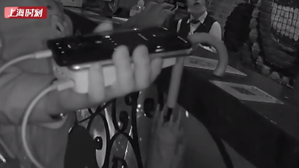 视频 | 上海民警KTV大战假警察 一句话为女子保住15万元